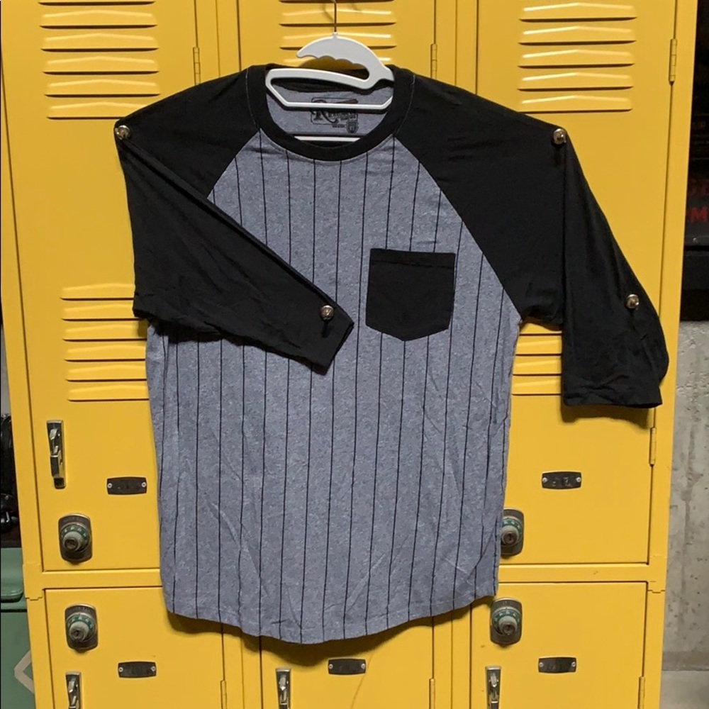 Baseball style 3/4 sleeve shirt.